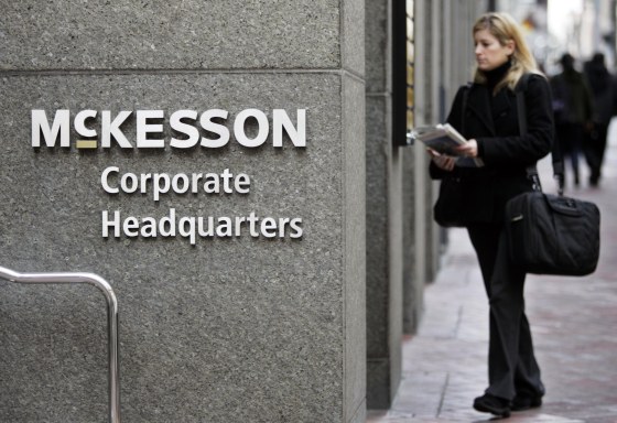 Image: A woman walks into McKesson Corporation's headquarters in San Francisco on Jan. 31, 2008.