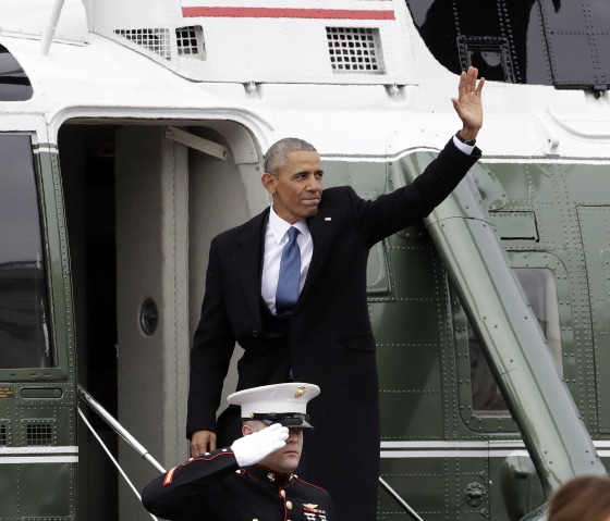 Image: Former President Barack Obama waves as he boards a Marine helicopter