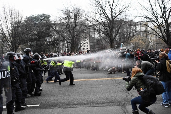 Image: Police pepper spray at anti-Trump protesters during clashes in Washington, D.C. on Jan. 20.