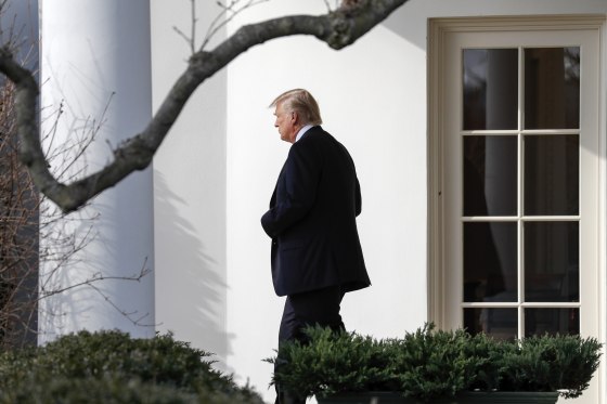 Image: Trump walks out of the Oval Office to board Marine One