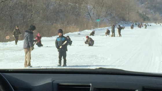 Image: Some of the North Koreans clearing the route near the ski resort.