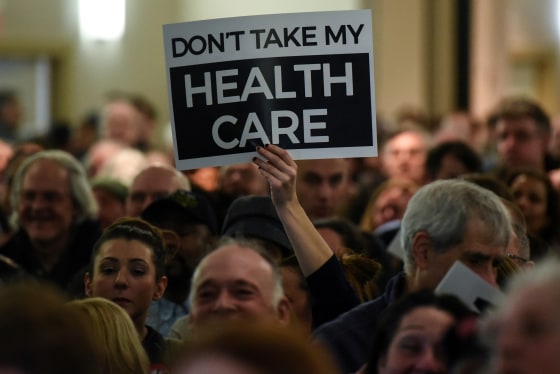 Image: People demonstrate for the Affordable Care Act and against Trump during the First Stand Rally in Newark