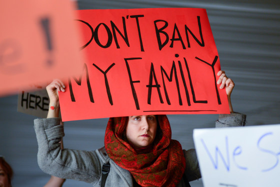 Image: Demonstrators shout slogans during anti-Donald Trump immigration ban protests outside Terminal 4 at San Francisco International Airport in San Francisco