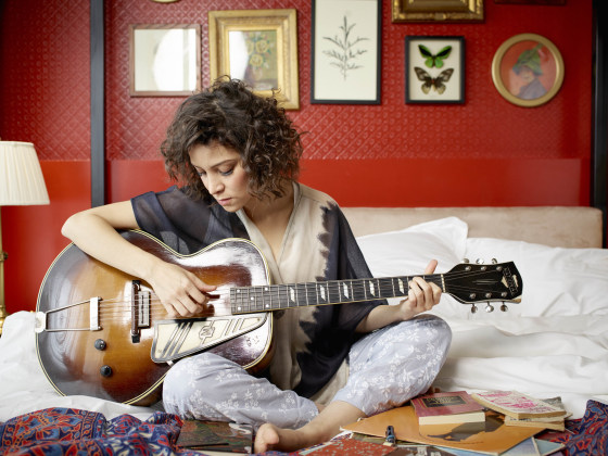 Gaby Moreno playing guitar
