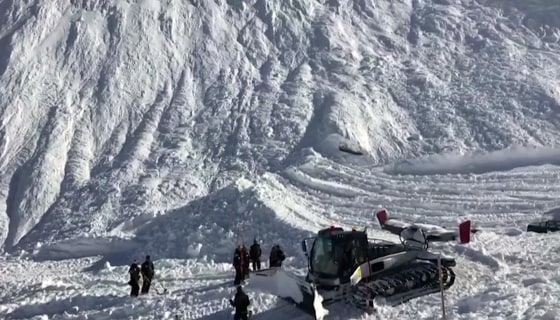 Image: Rescue personnel work at the site of an avalanche at Lavachet Wall in Tignes, France, Monday.