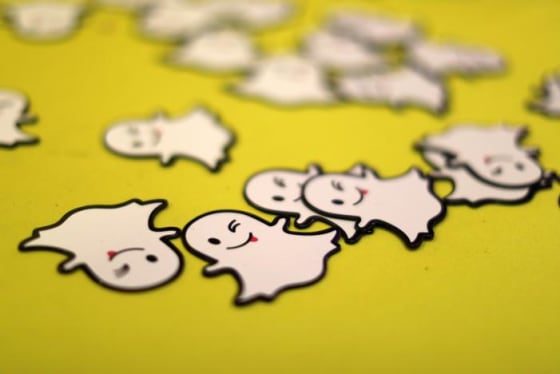 FILE PHOTO: The logo of messaging app Snapchat is seen at a booth at TechFair LA, a technology job fair, in Los Angeles