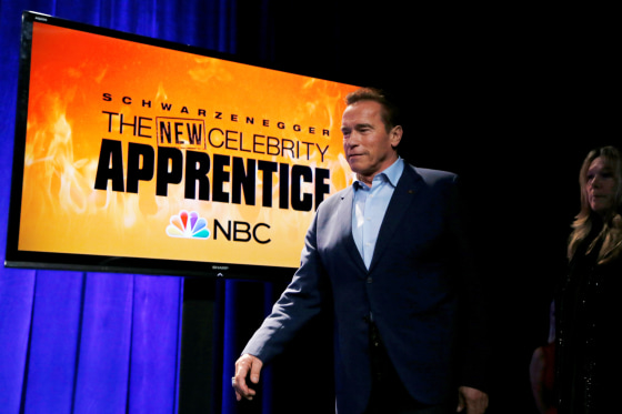 Image: Host Arnold Schwarzenegger walks on stage to participate in a panel for \"The New Celebrity Apprentice\" in Universal City, California, Dec. 9, 2016.