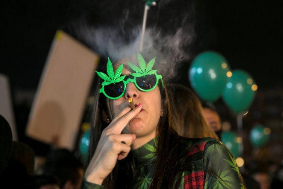 Image: A woman smokes in Tel Aviv, Israel, on Feb. 4, 2017