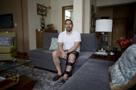 In this March 12, 2017 photo, plastic surgeon Rodrigo Munoz poses for a portrait, at home in Mexico City. President Donald Trump loomed large in the mind of Mexico City plastic surgeon Rodrigo Munoz as he was deciding where to go for a winter ski vacation.