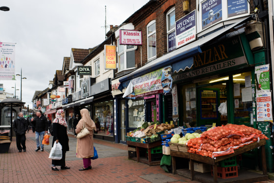 Image: Two women shop at a local grocery in Bury Park, Luton on Feb. 4, 2015.