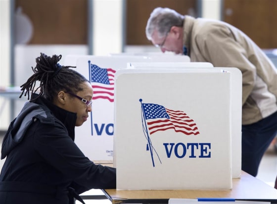 People vote in the Super Tuesday primary at Centreville High School March 1, 2016, in Centreville, Virginia.