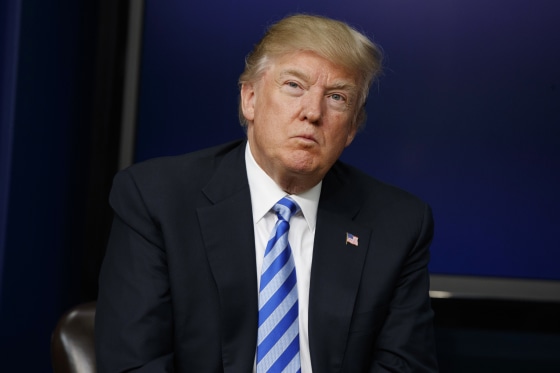Image: Trump listens to a question during a town hall