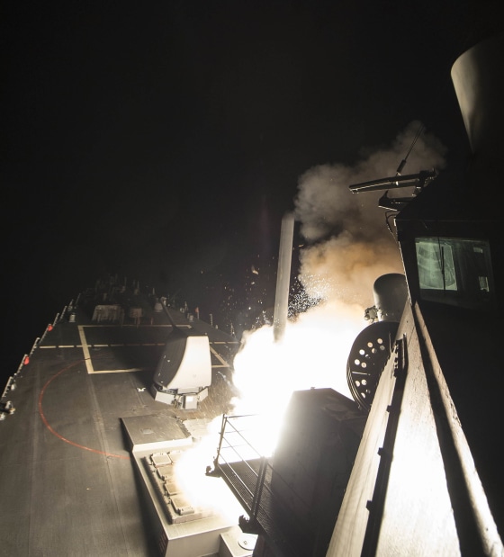 Image: The USS Ross fires a tomahawk land attack missile
