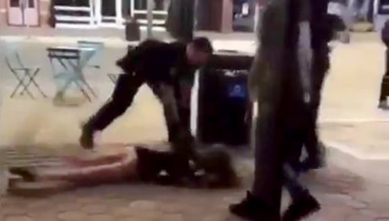 Image: A screen shot of a video posted online shows an interaction between 22 year-old Colorado State junior Michaella Surat and police.