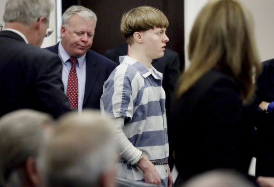 Image: Dylann Roof walks into the courtroom to enter his guilty plea on murder charges