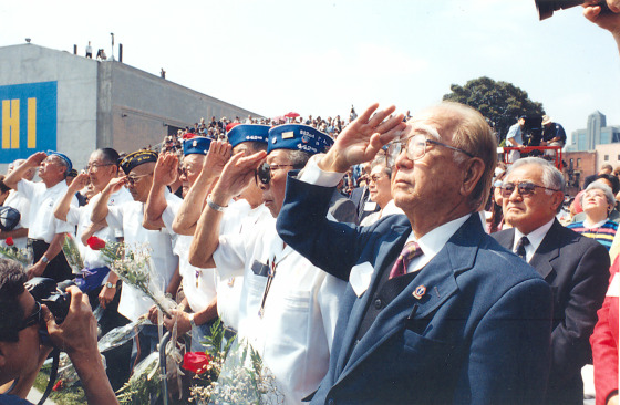 Image: WWII Nisei veterans saluting the flag at the Go For Broke monument in downtown Los Angeles.