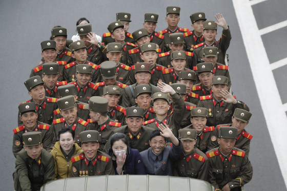 Image: North Korean military personnel sit on a truck in Pyongyang.