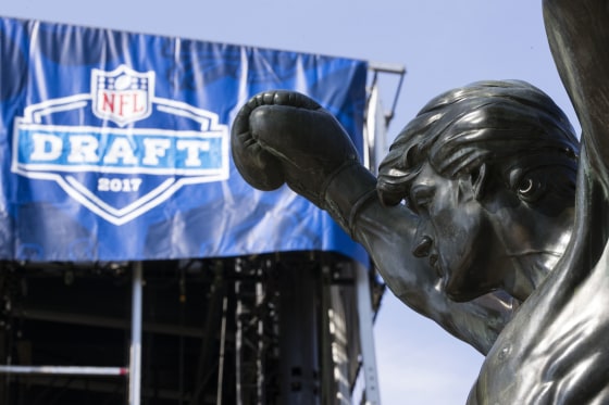 The Rocky statue stands in view of the stage being constructed for the upcoming 2017 NFL football draft on the steps of the Philadelphia Museum of Art in Philadelphia, Tuesday, April 18, 2017. (AP Photo/Matt Rourke)