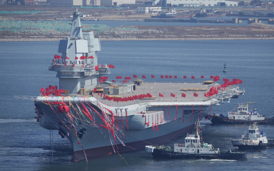 Image: China's first domestically built aircraft carrier is seen during its launching ceremony in Dalian