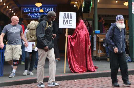 The "Red Chador" standing in Seattle after the November elections.