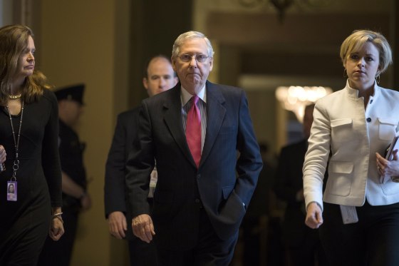 Image: McConnell walks to the Senate floor for procedural votes on the confirmation of Supreme Court nominee Neil Gorsuch
