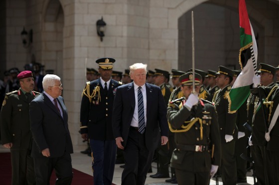 Image: U.S. President Donald Trump and Palestinian President Mahmoud Abbas review the honor guard during a reception ceremony at the presidential headquarters in the West Bank town of Bethlehem