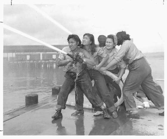 The @17.21women Instagram account shares images of Asian-American women who challenge the status quo. In this photo, a crew of women fire fighters train in Hawaii in 1941. From left to right: Elizabeth Moku, Alice Cho, Katherine Lowe, and Hilda Van Gieson.