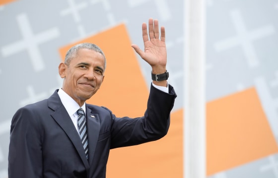Image: Barack Obama attends a discussion at Brandenburg Gate in Berlin