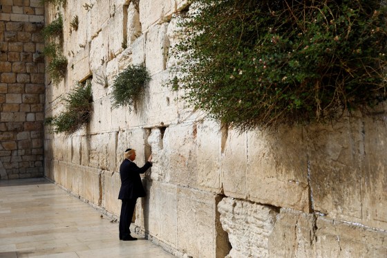 Image: Trump touches the Western Wall, Judaism's holiest prayer site, in Jerusalem's Old City