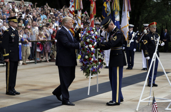 Image: President Donald Trump lays a wreath at The Tomb of the Unknown Solider at Arlington National Cemetery, Monday, May 29, 2017, in Arlington, Virginia.