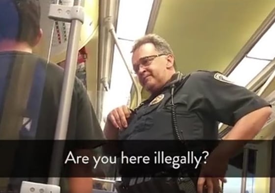 A transit police officer asks Ariel Vences-Lopez about his immigration status in Minneapolis.