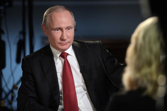 Image: Putin speaks with Kelly during an interview