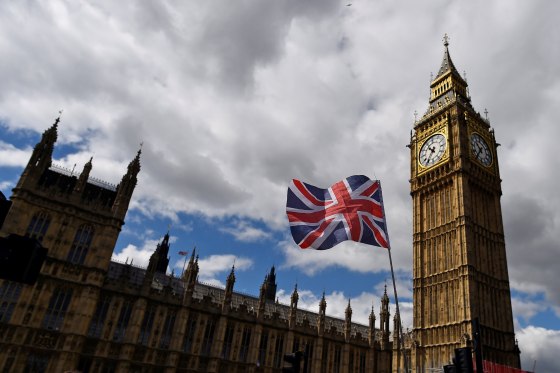 Image: The Union Flag flies near the Houses of Parliament the day before a general election in central London