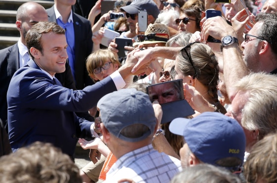 Image: French President Emmanuel Macron leaves the polling station of the town hall in Le Touquet-Paris-Plage, after casting his vote