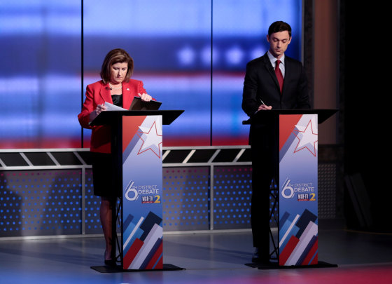 Image: Republican candidate Karen Handel and Democratic candidate Jon Ossoff prepare for Georgia's 6th Congressional District special election debate at WSB-TV studios in Atlanta