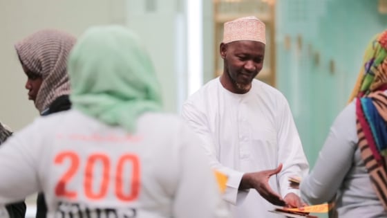 An imam receives cards from DoSomething.org's "Sincerely, Us" project. The project hopes to send cards to each mosque in the U.S. during the month-long Ramadan.