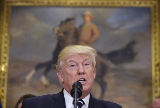 Image: Donald Trump speaks in the Roosevelt Room of the White House in Washington