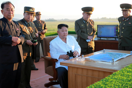 Image: North Korean leader Kim Jong Un watches the test of a new-type anti-aircraft guided weapon system organised by the Academy of National Defence Science