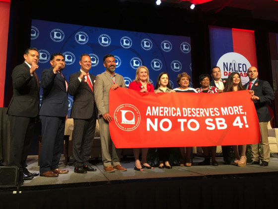 NALEO offiicals condemn the state's new immigration policing law that they say will increase racial profiling