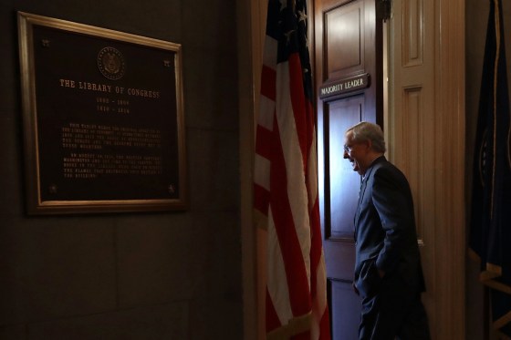 Image: McConnell arrives in his office in the U.S. Capitol