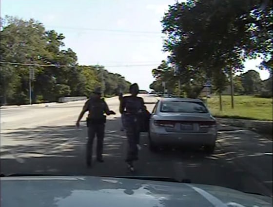Image: Texas state trooper Brian Encinia pointing a Taser as he orders Sandra Bland out of her vehicle in Prairie View