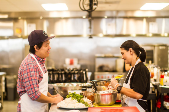 Foodhini founder Noobstaa Philip Vang with chef Melissa Frabotta at the Union Kitchen space in Washington, D.C.