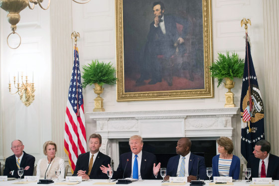 Image: US President Donald Trump speaks alongside Republican Senators during a meeting to discuss the health care bill