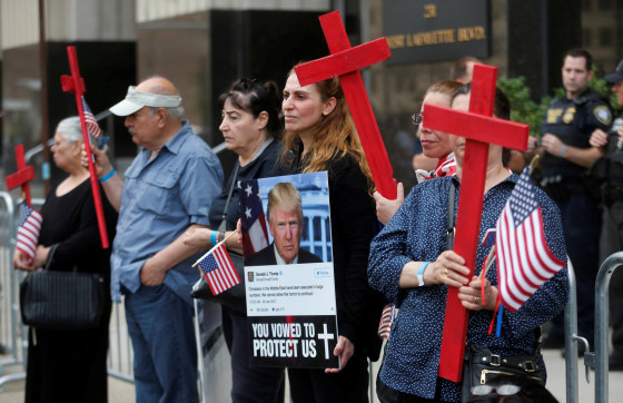 Image: FILE PHOTO: Protesters rally outside the federal court just before a hearing to consider a class-action lawsuit filed on behalf of Iraqi nationals facing deportation, in Detroit
