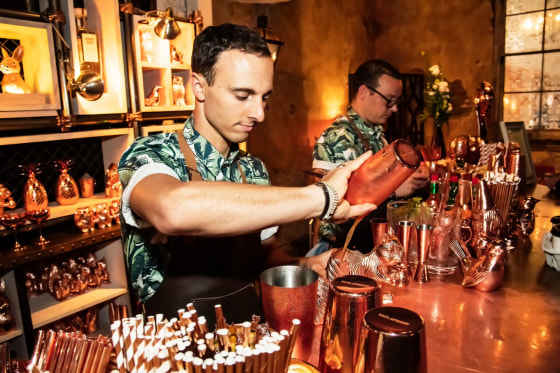 Maxime Belfand and Davide Segat serving Elyx cocktails at House of Elyx at Tales of the Cocktail.