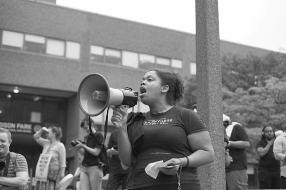 DiDi Delgado protesting in Boston, Mass., on Saturday, August 19.