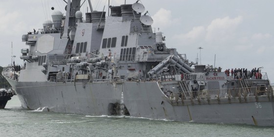 The USS John S. McCain steers towards Changi Naval Base, Singapore, on Aug. 21 after a collision with a merchant vessel off Singapore.