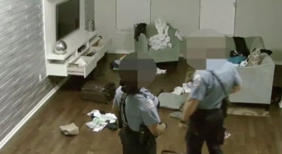 Security camera footage obtained by NBC Washington shows police officers in the home of burglary victim Clarence Williams.
