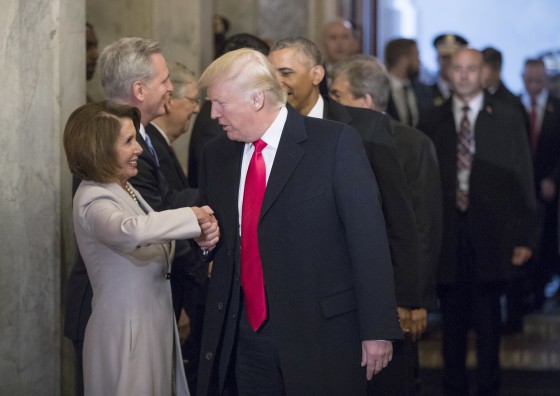 Image: President-elect Donald Trump greets House Minority Leader Nancy Pelosi
