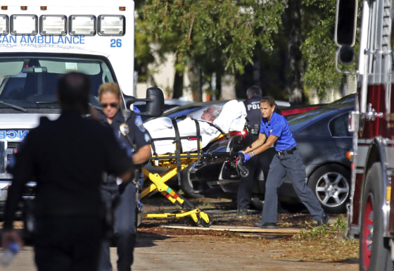 Image: A woman is transported from The Rehabilitation Center at Hollywood Hills